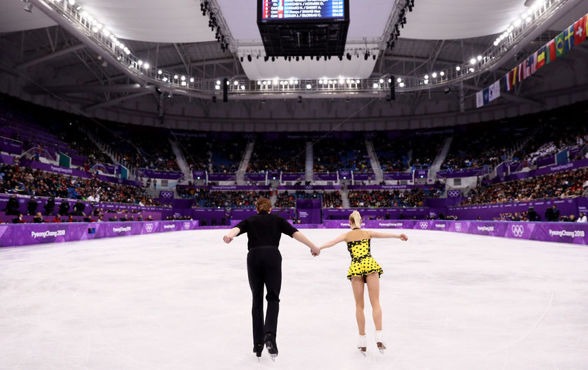 Соревнования спортивных пар на Олимпиаде в Пхенчхане. Евгения Тарасова и Владимир Морозов. Фото Getty