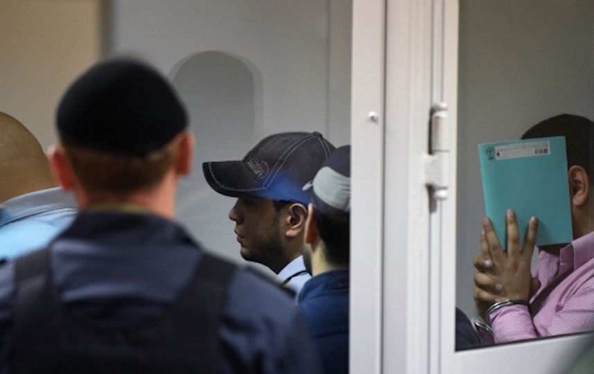Члены банды ГТА/GTA, обвиняемые в серии убийств водителей, в Мособлсуде во время оглашения приговора. Фото РИА Новости