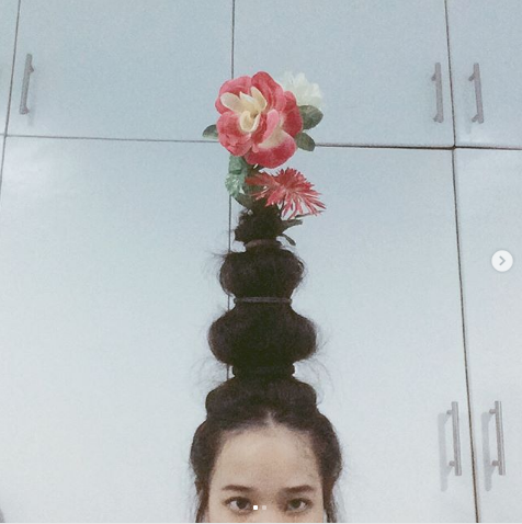 #FlowerVaseHair. Фото Instagram/lhynxxi