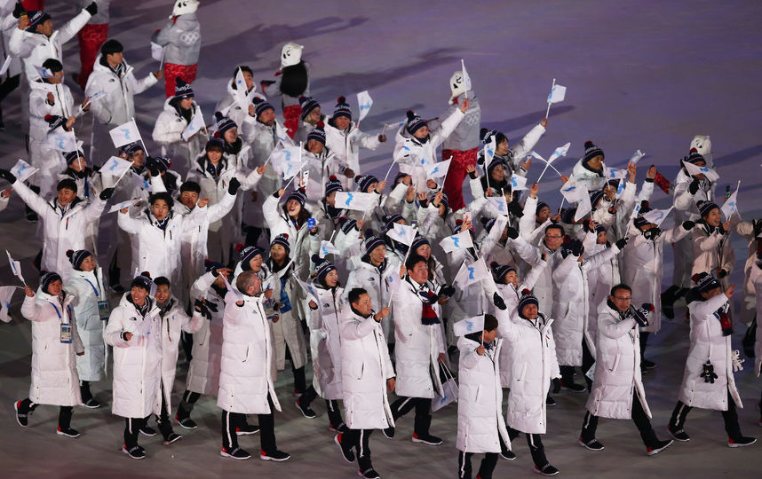 На Олимпиаде 2018 года команды сборных Сеерной и Южной Кореи прошли под одним флагом. Фото Getty