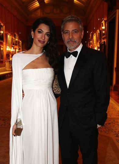 Гости на приеме принца Чарльза. Амаль Клуни и Джордж Клуни. Фото Getty