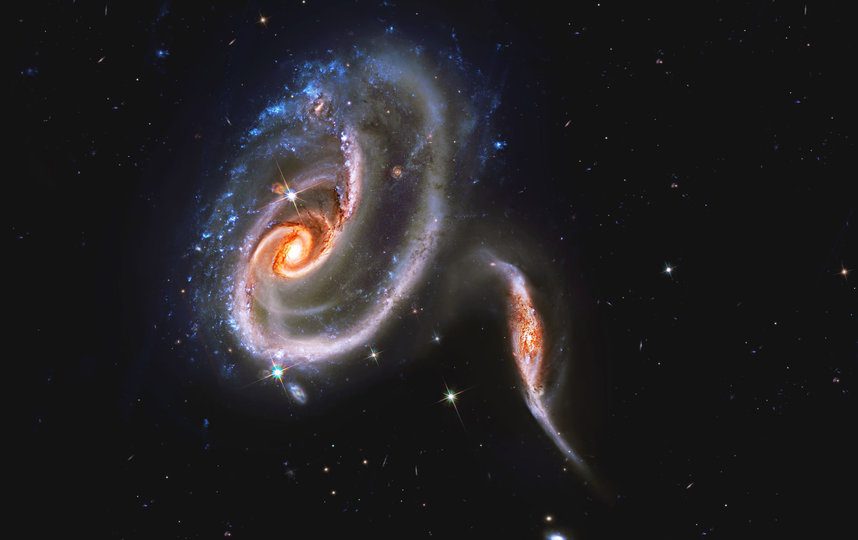 НАСА опубликовало фотографию "титанического сражения" между двумя галактиками, входящими в группу Arp 273. Фото NASA 