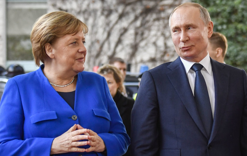 Ангела Меркель и Владимир Путин на Берлинской конференции. Фото AFP