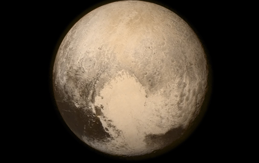 Плутон. Фото сделано станцией "Новые горизонты" с расстояния 768 000 км от поверхности. Фото Getty