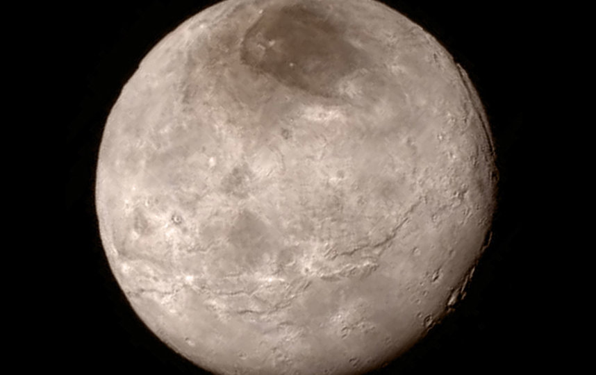 Фото Плутона, сделанное с расстояния 466 000 км. Фото Getty