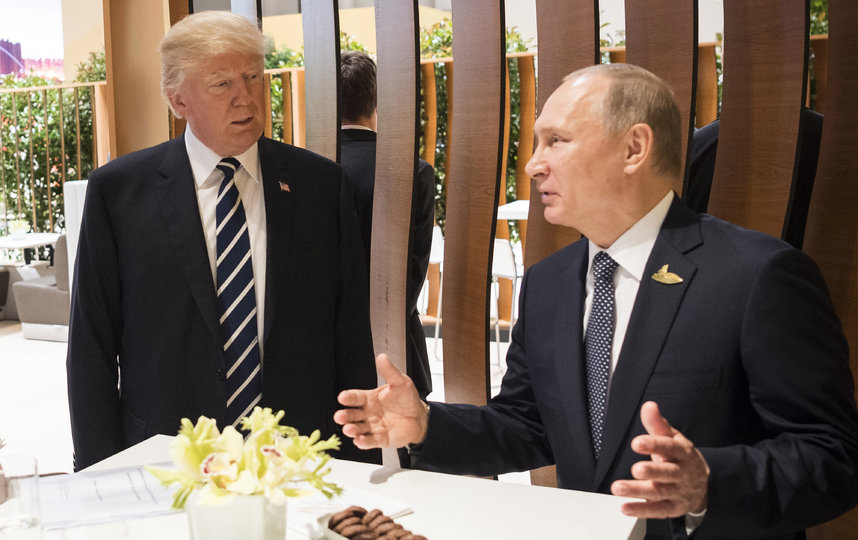 Дональд Трамп и Владимир Путин на саммите G20 в 2017 году. Фото Getty