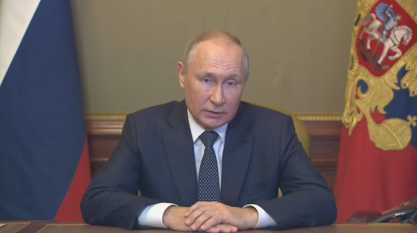 Владимир Путин во время выстулпения перед членами Совбеза РФ. Фото Скриншот прямой трансляции.