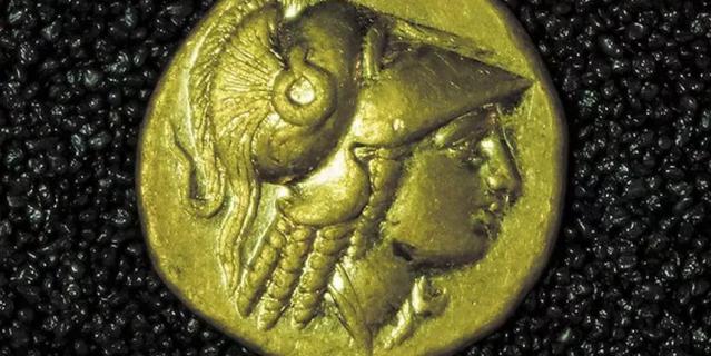 На лицевой стороне монет изображена голова богини Афины в коринфском шлеме.