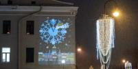 Фасады домов в Петербурге украсили новогодними проекциями с детскими рисунками